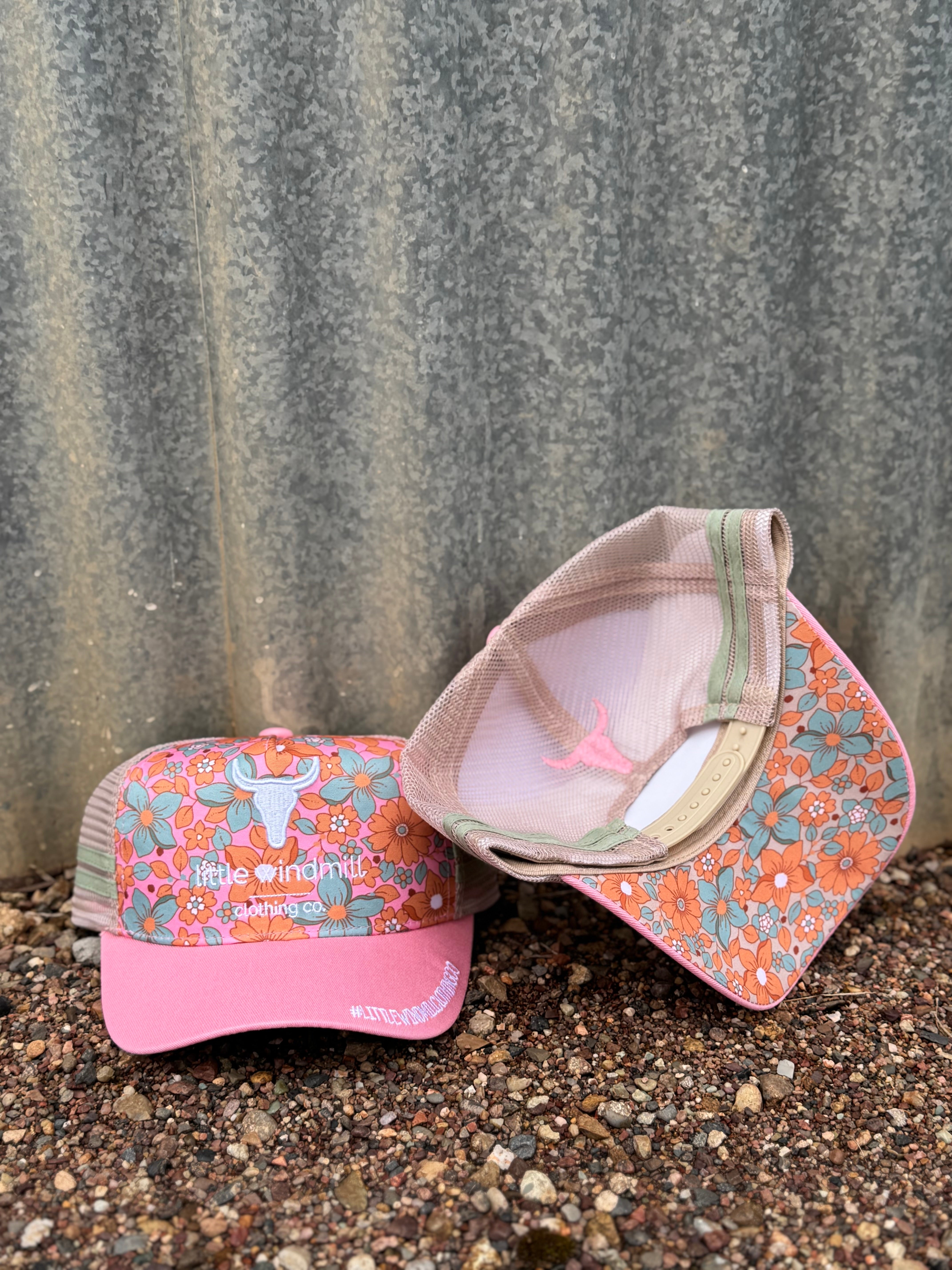 Toddlers and youth floral orange pop cap showing vibrant orange floral print in structured cap style