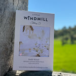 Horse field organic cotton swaddle open flat lay showing full size and pastoral horse scene