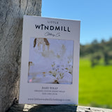 Horse field organic cotton swaddle open flat lay showing full size and pastoral horse scene