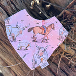 Waterproof pink long horn bib back showing easy-clean wipeable surface and adjustable fastening