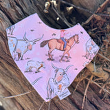 Waterproof pink long horn bib back showing easy-clean wipeable surface and adjustable fastening
