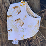 Waterproof horse field bib front view showing beautiful horse field scene print on wipeable waterproof fabric