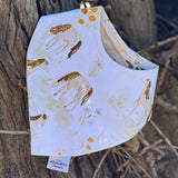 Waterproof horse field bib front view showing beautiful horse field scene print on wipeable waterproof fabric