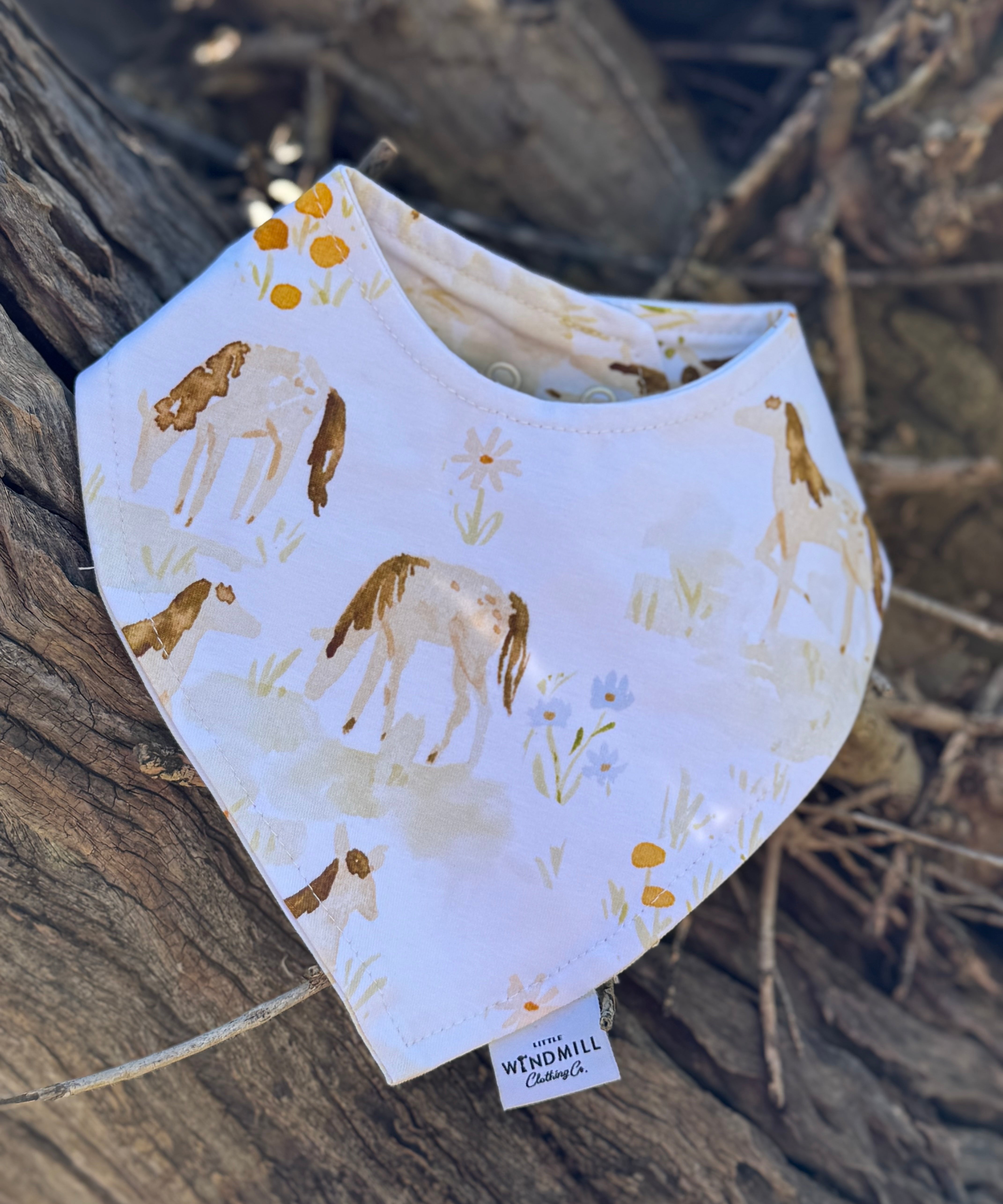 Waterproof horse field bib back showing easy-clean wipeable surface and adjustable neck