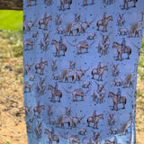 Blue long horn organic cotton swaddle draped showing generous swaddle size for newborns
