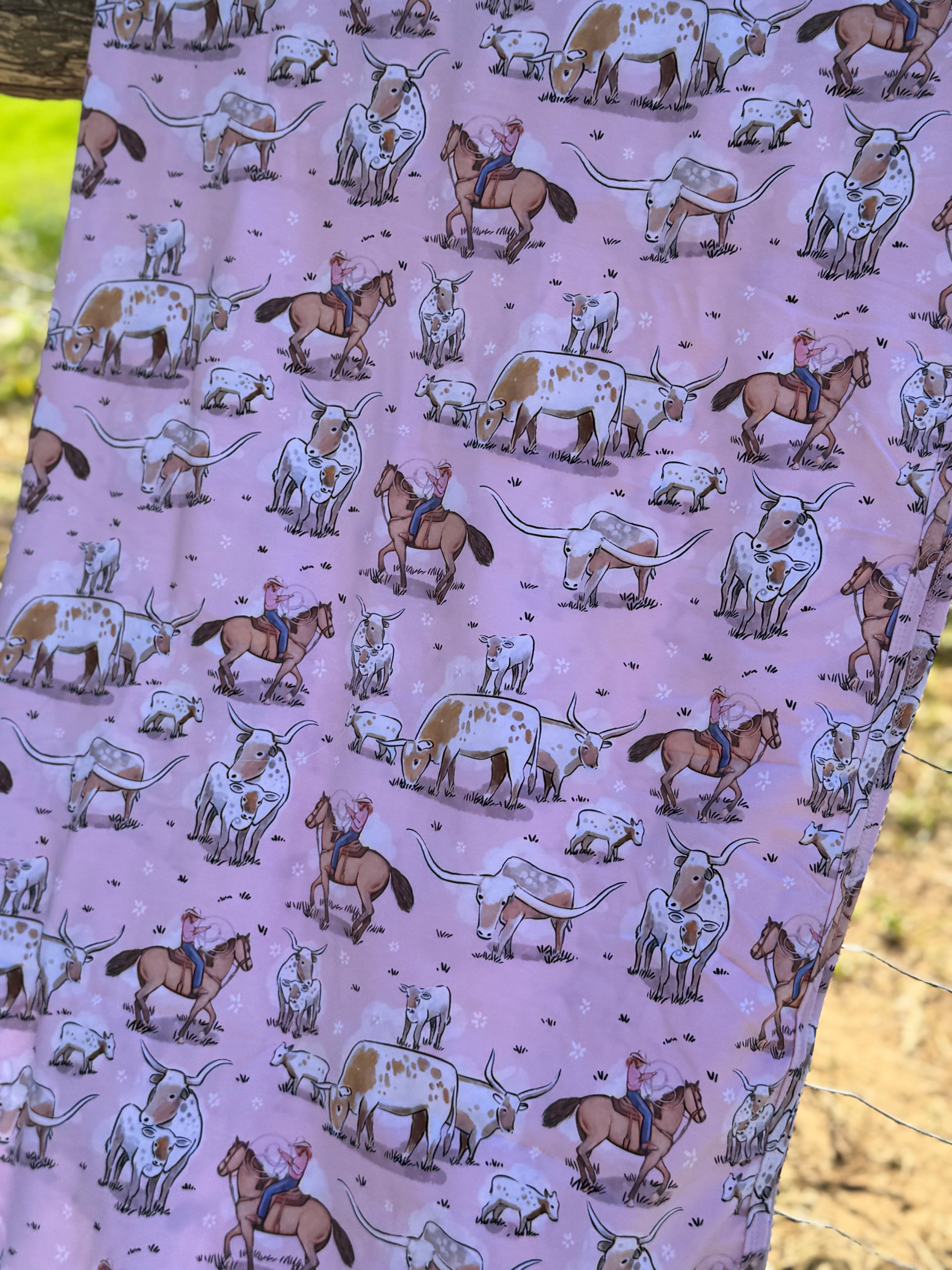 Pink long horn jersey organic cotton swaddle showing beautiful pink longhorn print on premium organic cotton