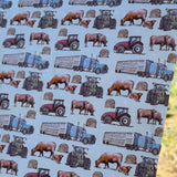 Ranch life swaddle tag detail showing 100% organic cotton certification and care instructions