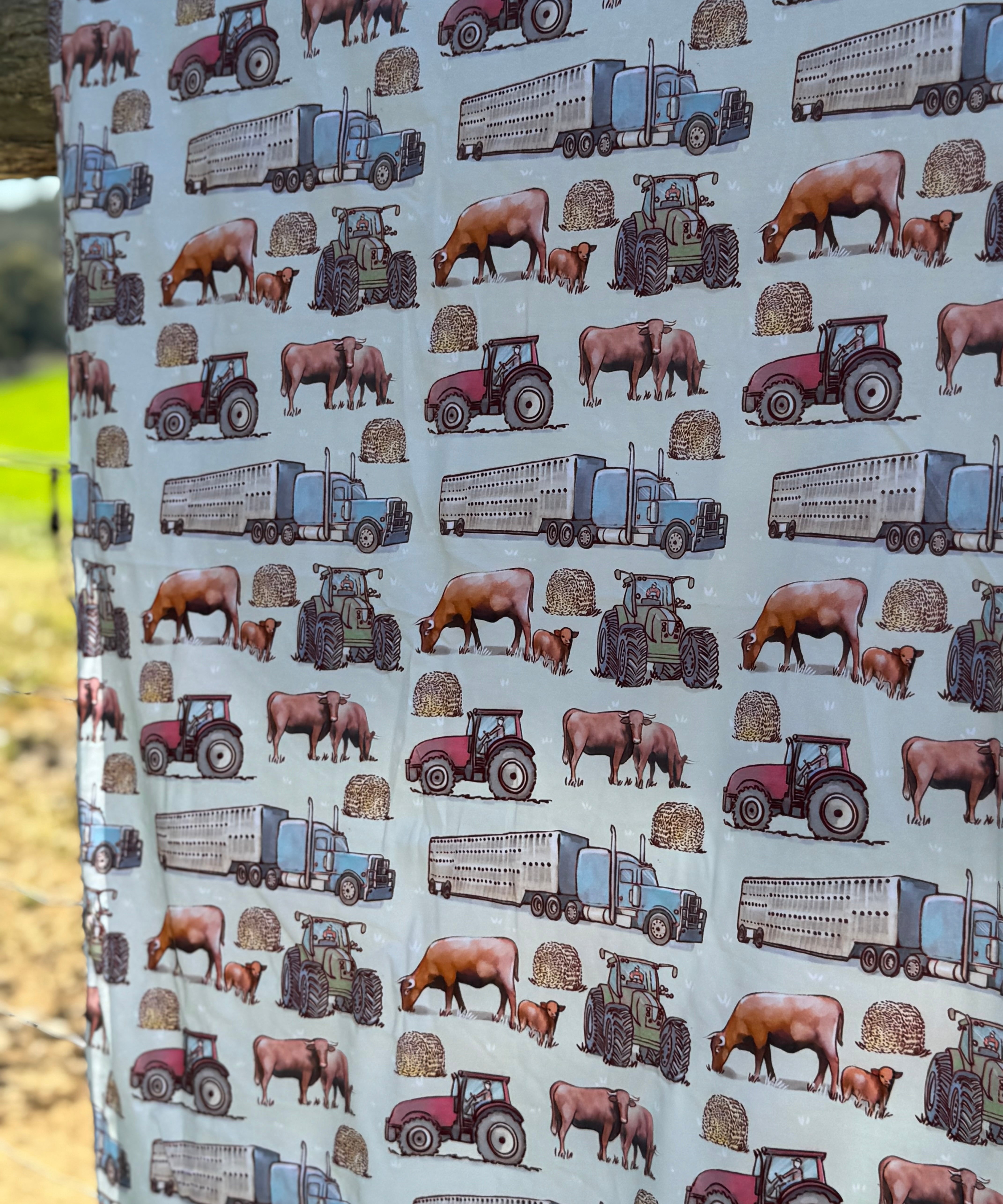 Ranch life organic cotton swaddle draped showing generous swaddle size for newborns