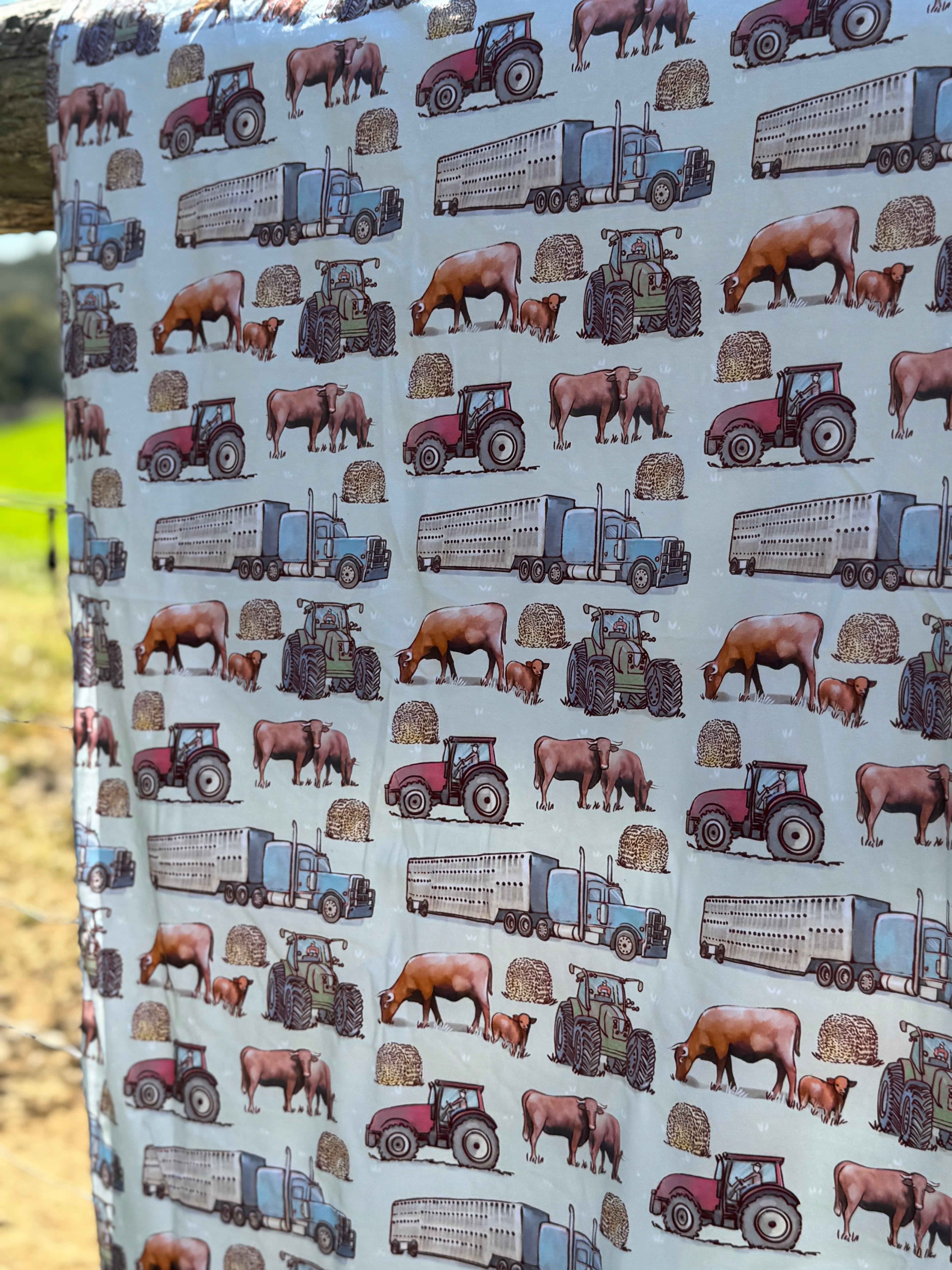 Ranch life organic cotton swaddle draped showing generous swaddle size for newborns