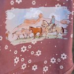Filly floral jumpsuit worn by girl showing sweet country casual playsuit style
