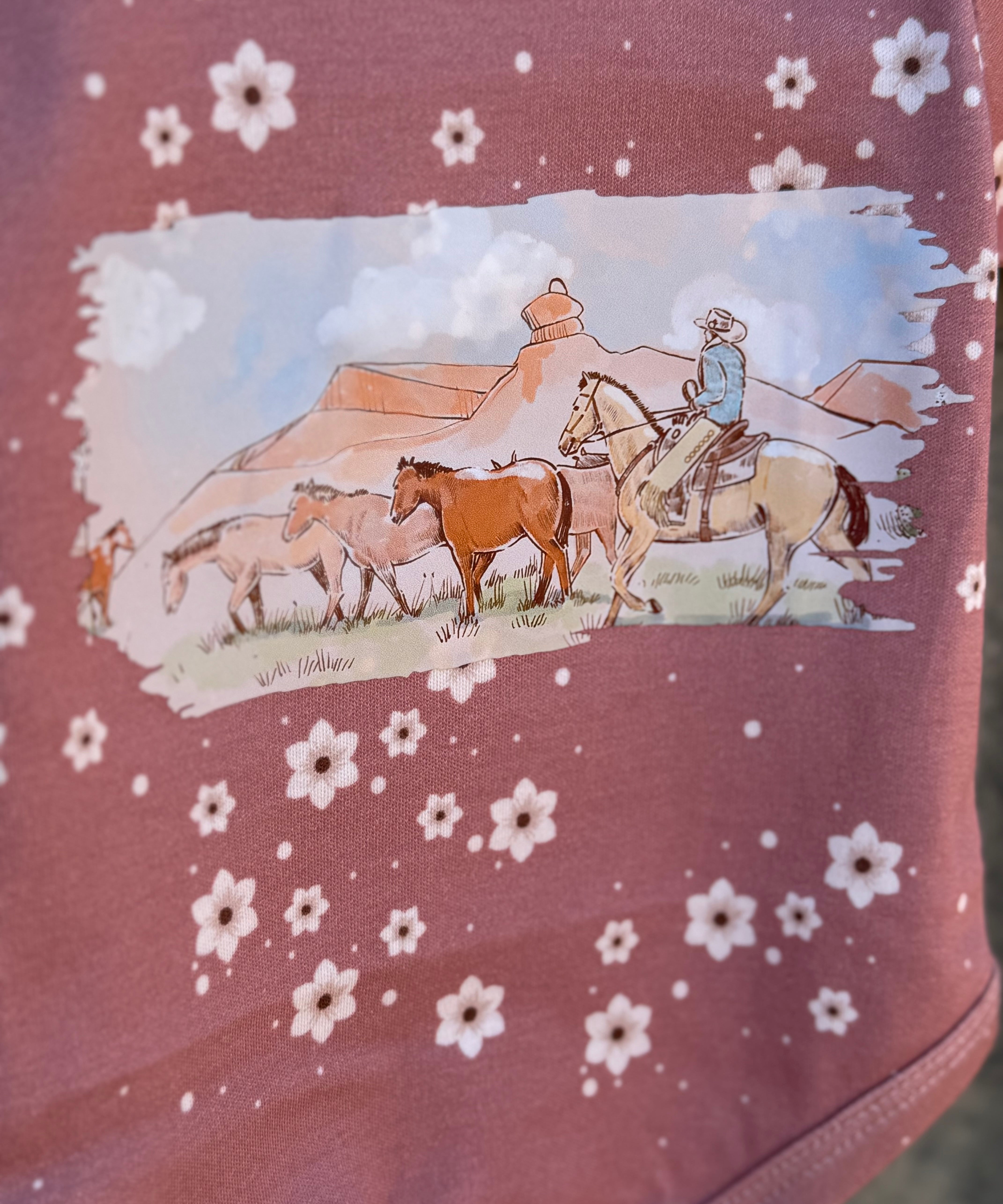 Filly floral jumpsuit worn by girl showing sweet country casual playsuit style
