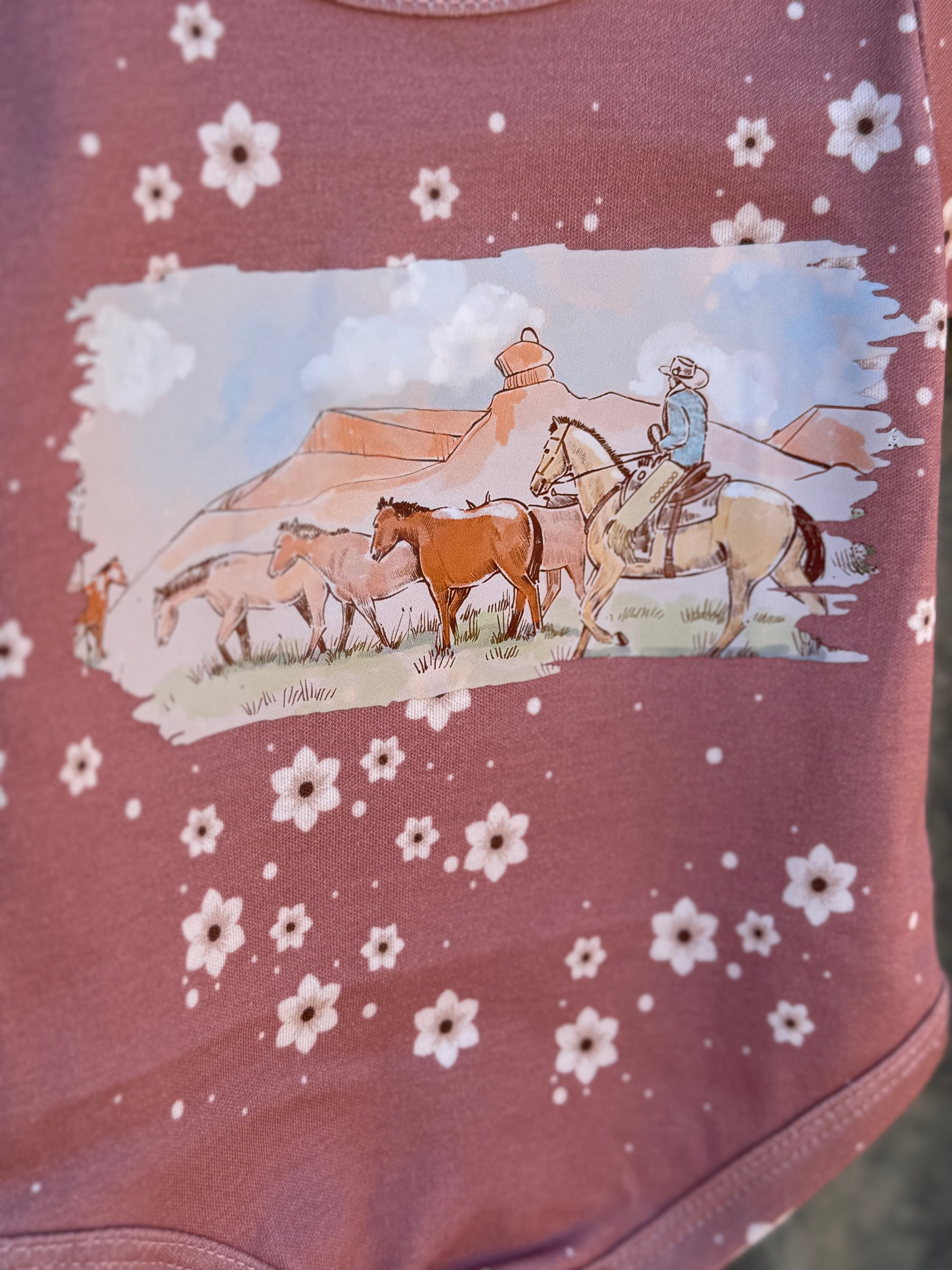 Filly floral jumpsuit worn by girl showing sweet country casual playsuit style