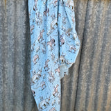 Organic light cotton muslin blue longhorn swaddle showing delicate blue longhorn print on breathable organic muslin