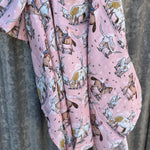 Organic light cotton muslin pink longhorn swaddle showing sweet pink longhorn print on breathable organic muslin