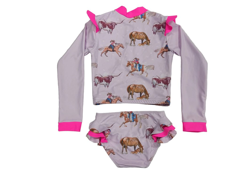 Children's swim set with cowgirl design on a light purple background