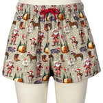 Shorts with a festive pattern on a mannequin against a gray background