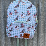 Teal cowgirl backpack front view showing vibrant teal cowgirl print on quality kids school bag