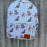 Teal cowgirl backpack front view showing vibrant teal cowgirl print on quality kids school bag