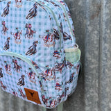 Teal cowgirl backpack print close-up showing detailed teal cowgirl graphic design