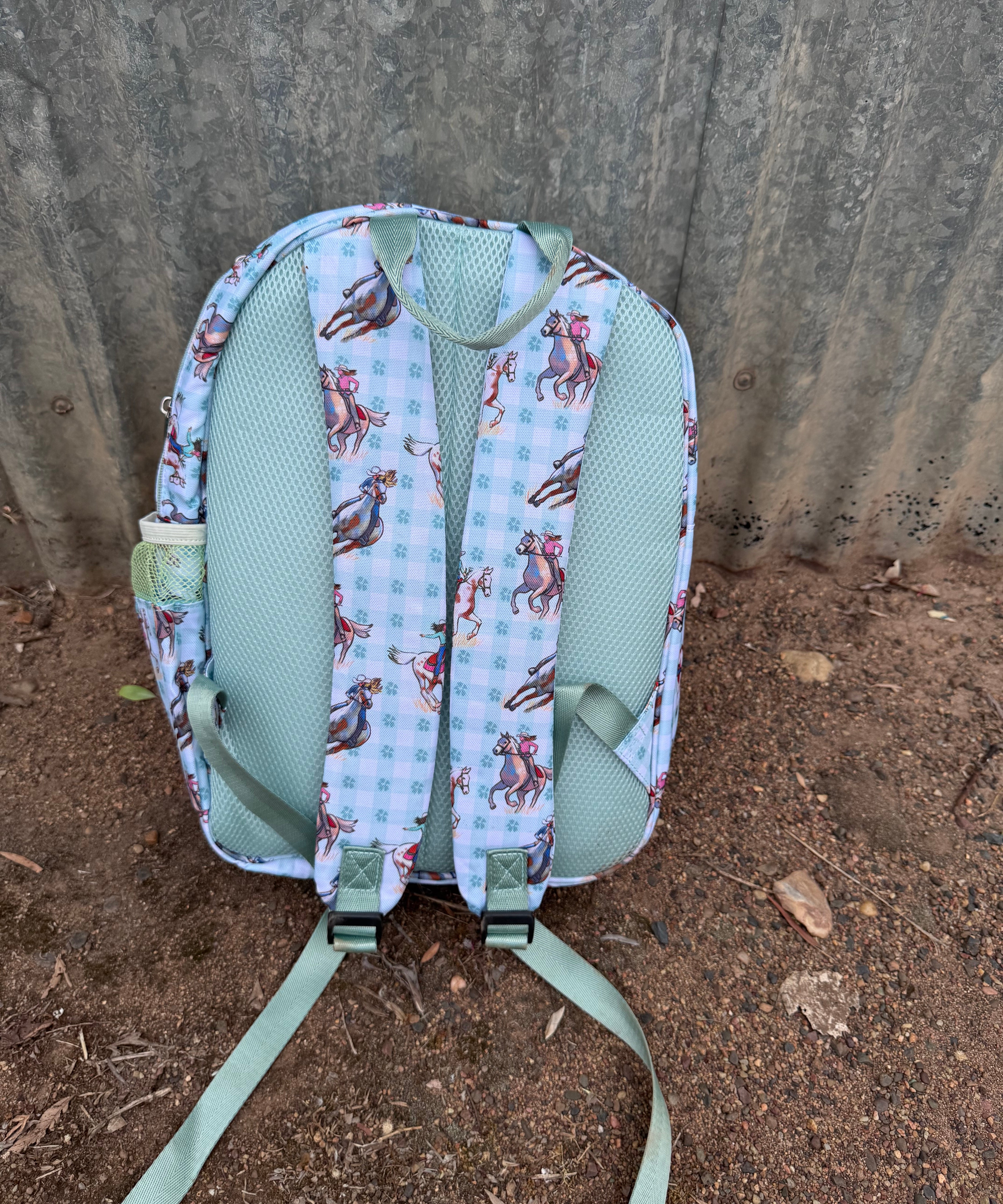 Teal cowgirl backpack back view showing padded straps and comfortable back panel