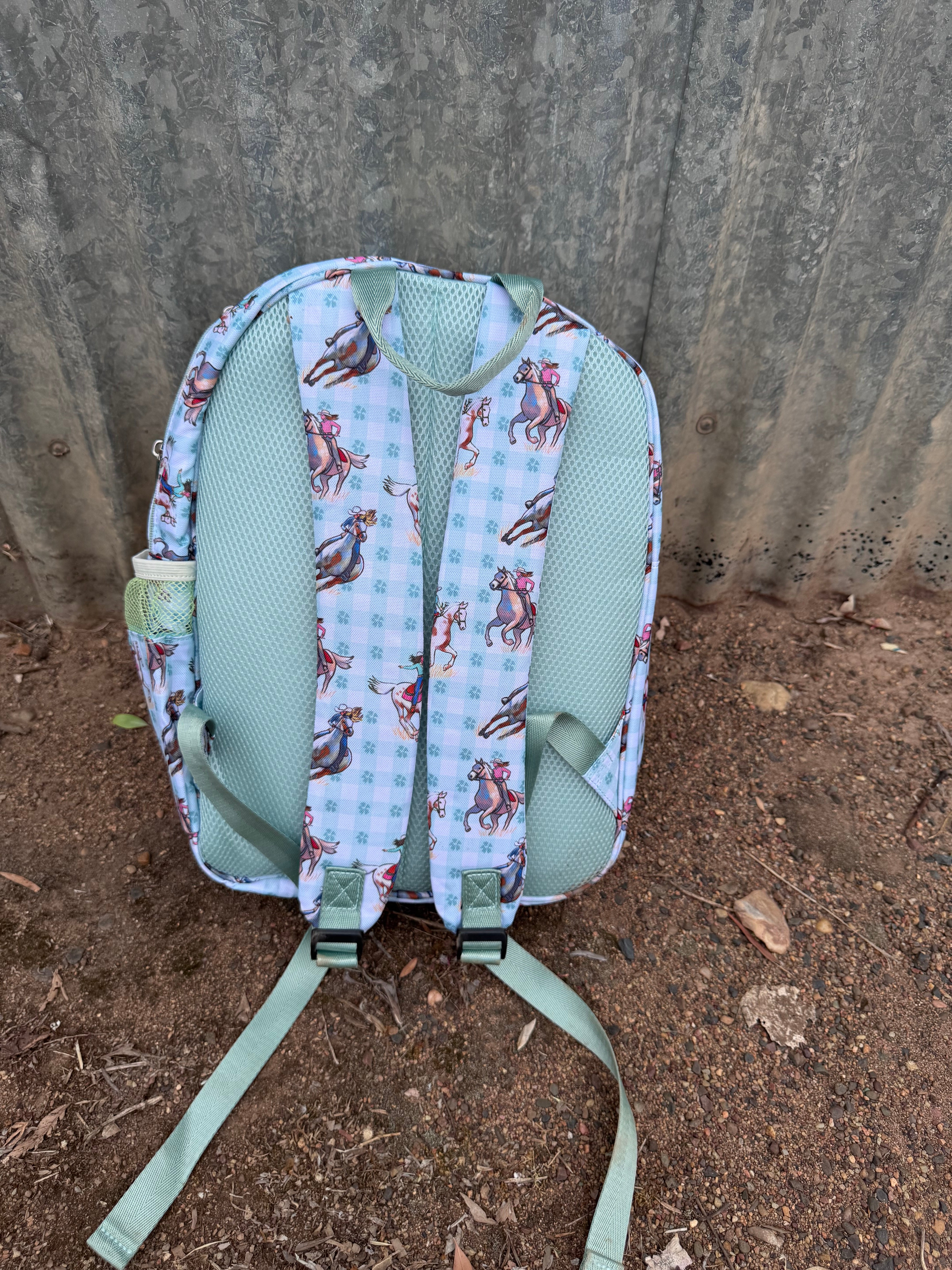 Teal cowgirl backpack back view showing padded straps and comfortable back panel