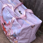 Pastel pink droving duffle bag flatlay showing full western droving design