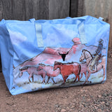 Pastel blue droving duffle bag print close-up showing detailed cattle droving print in pastel blue