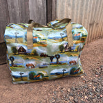Vintage farm scene duffle bag front view showing nostalgic vintage farm print on quality travel bag