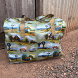 Vintage farm scene duffle bag front view showing nostalgic vintage farm print on quality travel bag