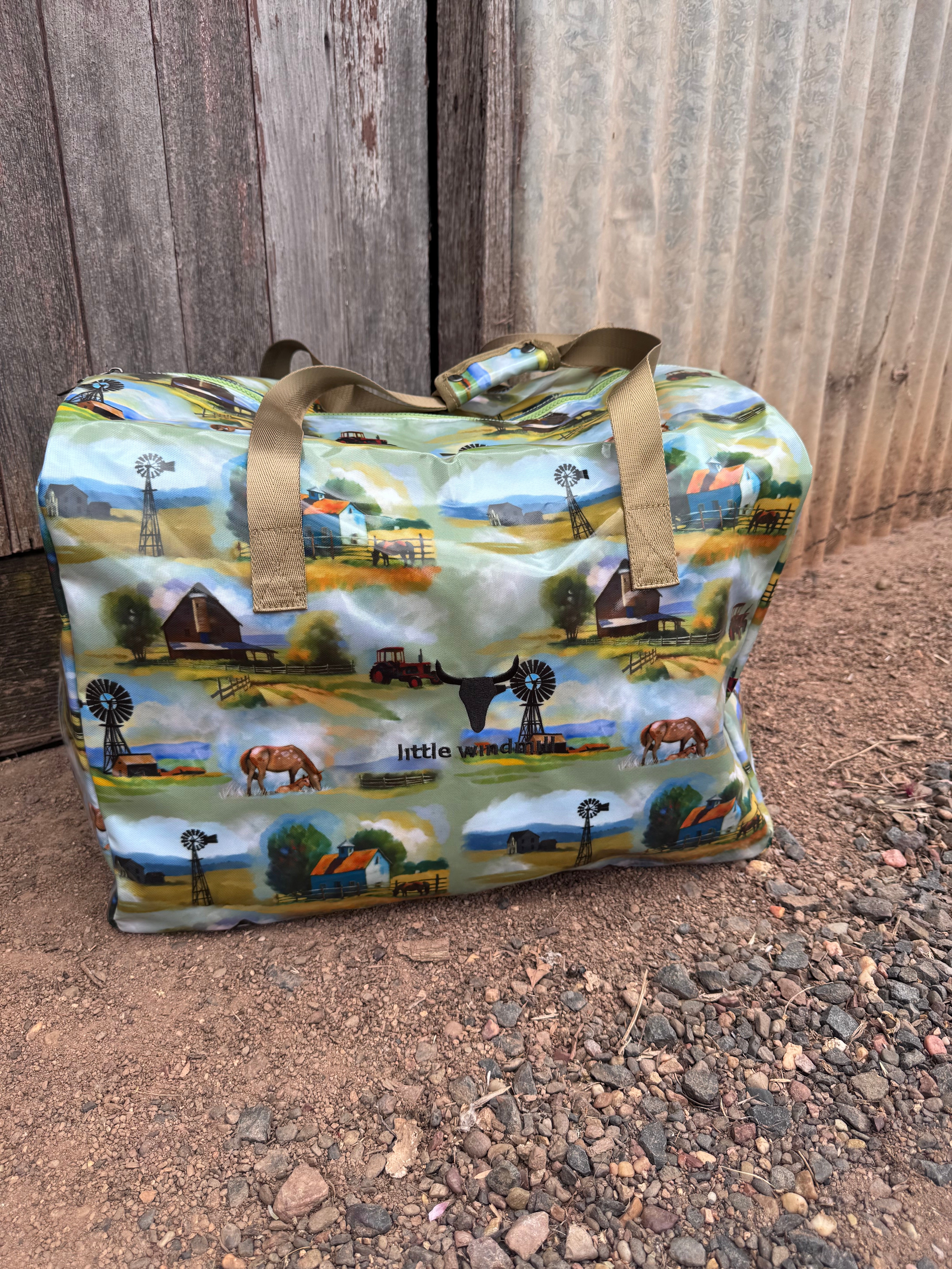 Vintage farm scene duffle bag front view showing nostalgic vintage farm print on quality travel bag