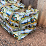 Vintage farm scene duffle bag open showing spacious interior and quality zip closure