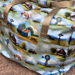 Vintage farm scene duffle bag side view showing roomy compartment and retro farm illustration