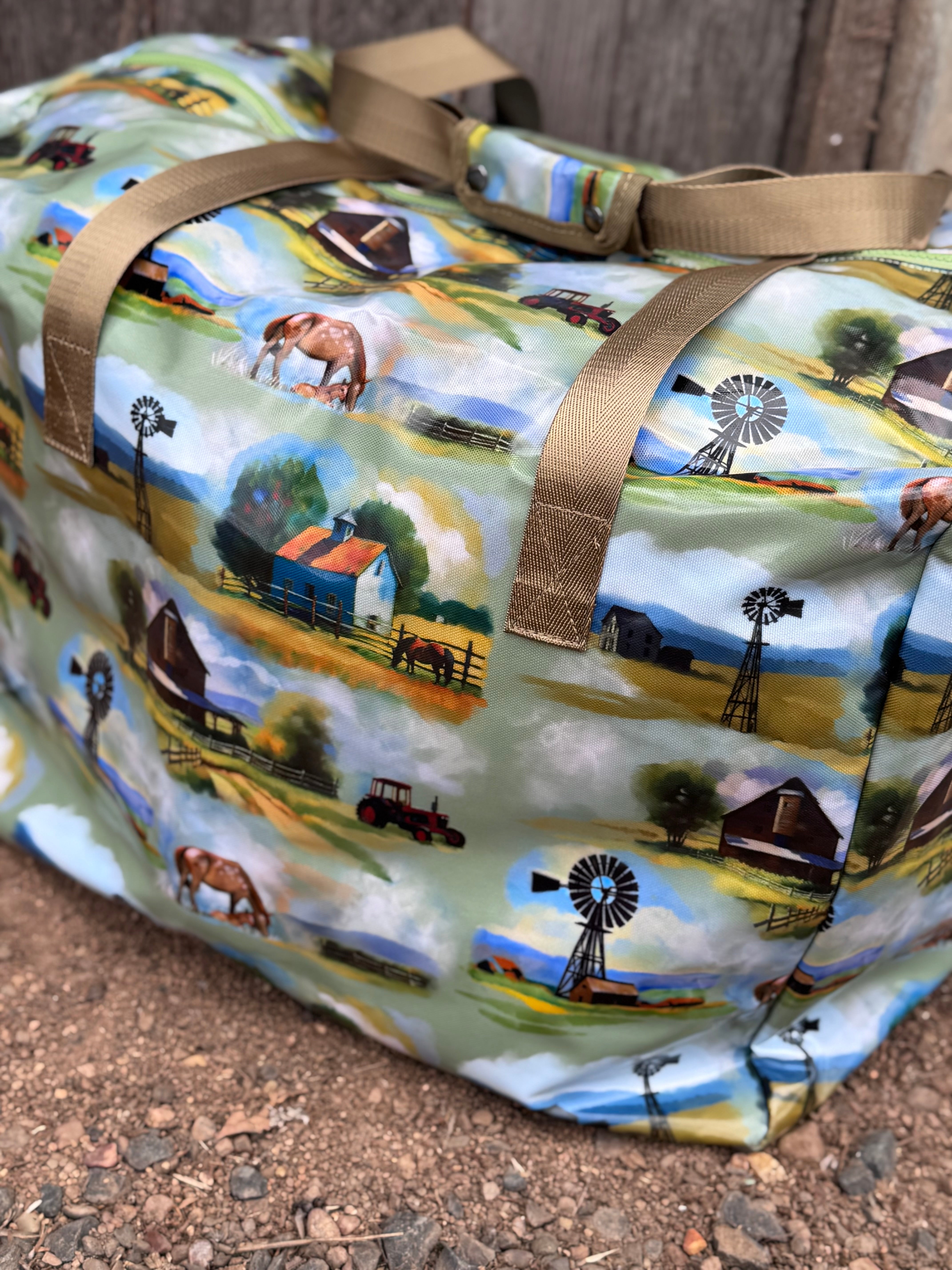 Vintage farm scene duffle bag side view showing roomy compartment and retro farm illustration