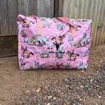 Pink longhorn duffle bag flatlay showing full vibrant longhorn print design