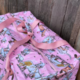 Pink longhorn duffle bag side view showing roomy compartment and bold pink longhorn design
