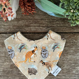 Waterproof Aussie animals bib showing native Australian animal print on wipeable waterproof fabric