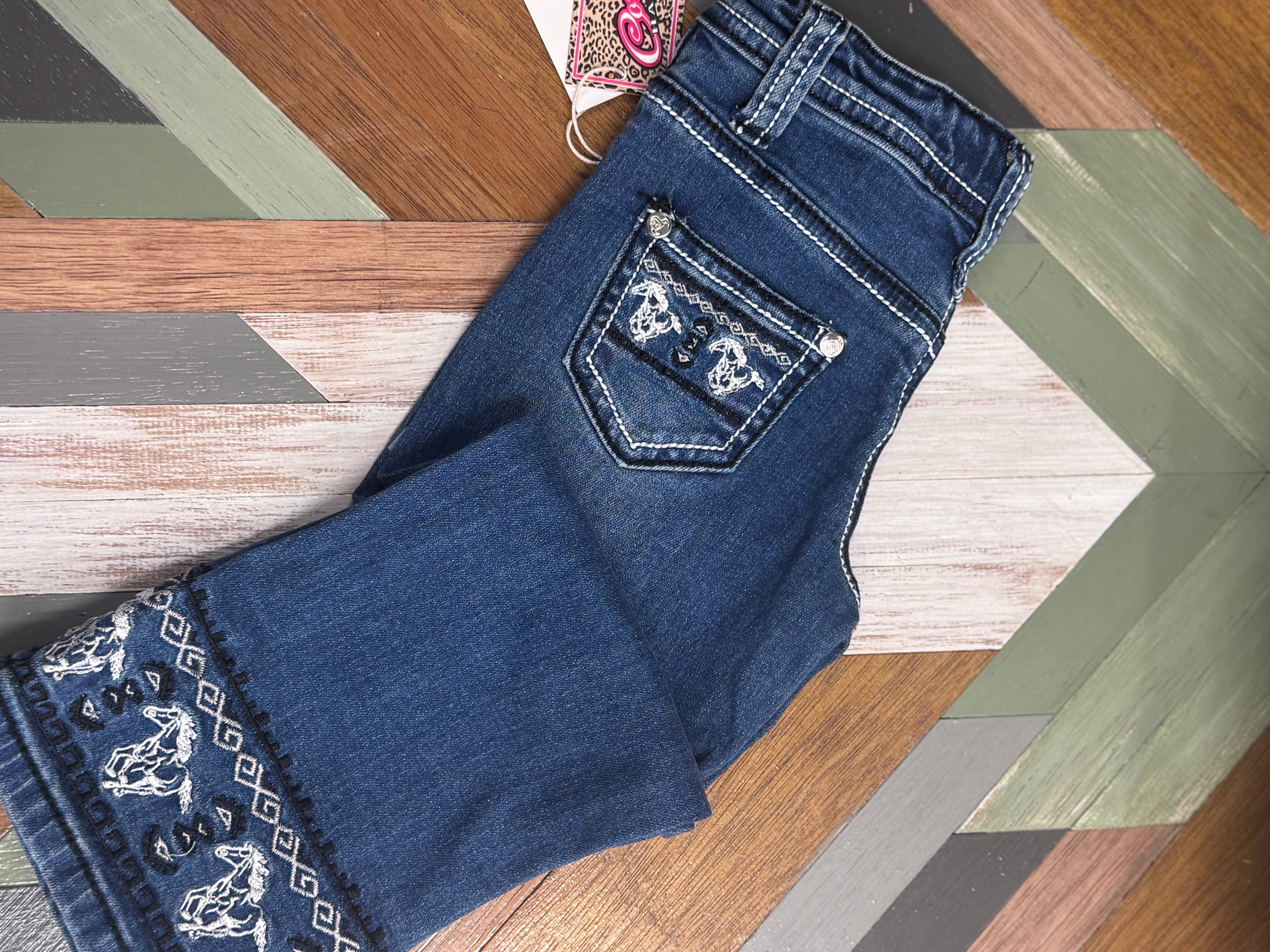 Hardware Cowgirl running horse toddler jeans back view showing denim quality and western horse detail
