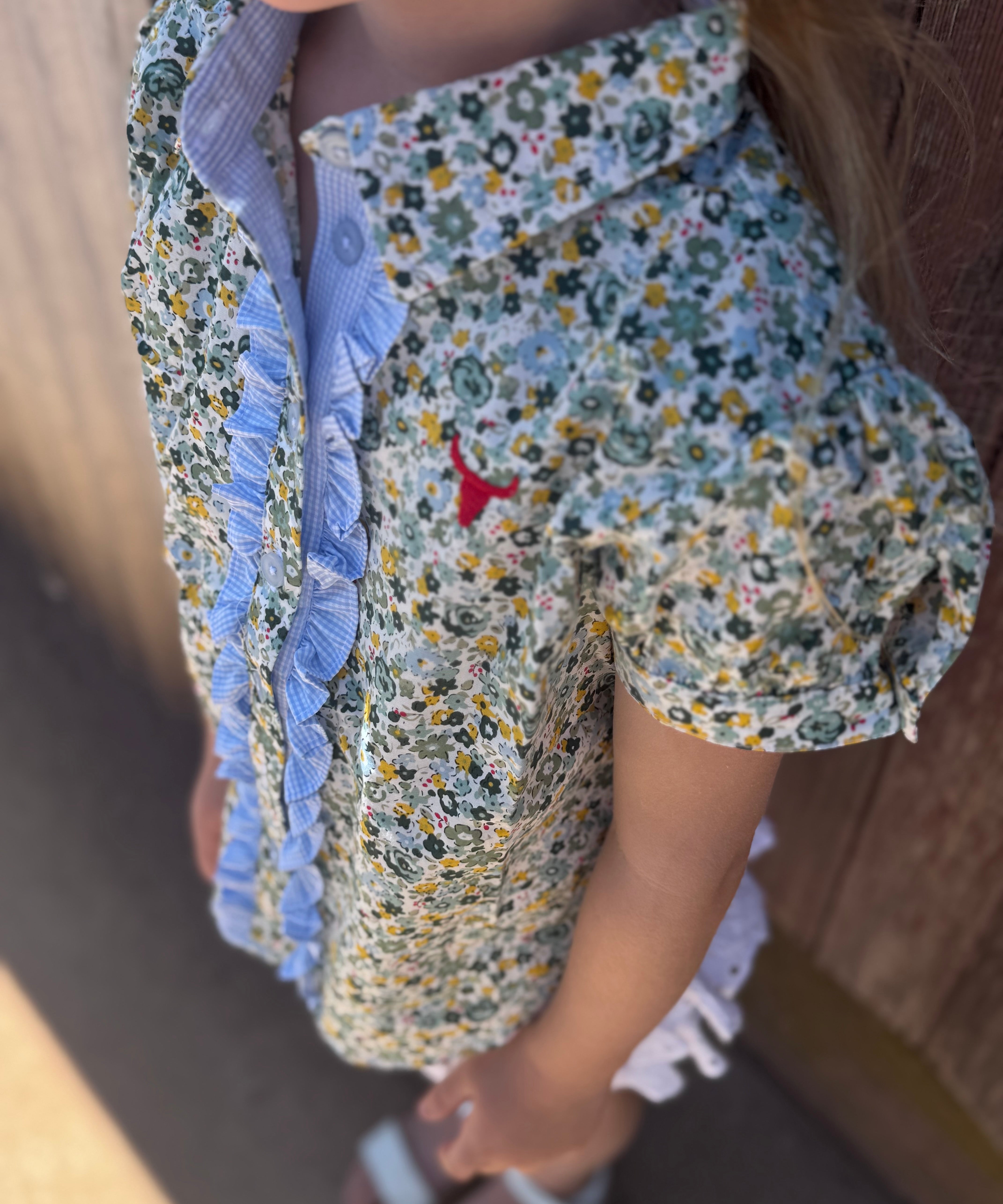 Dorothy soft blue floral sleeve blouse flatlay showing full soft blue floral blouse design