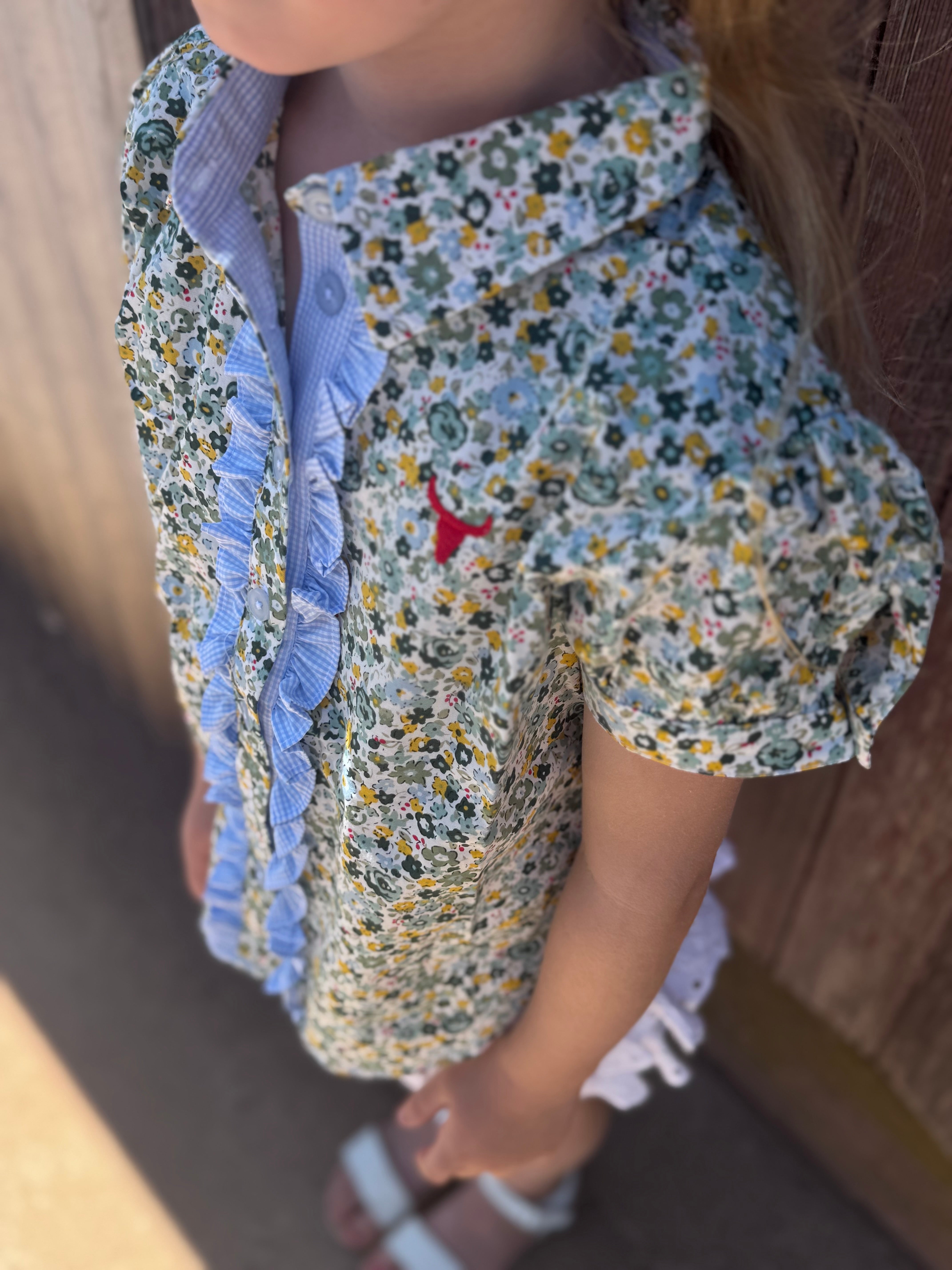 Dorothy soft blue floral sleeve blouse flatlay showing full soft blue floral blouse design