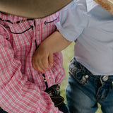 Stella pink check western yoke long sleeve shirt flatlay showing full pink check western shirt design