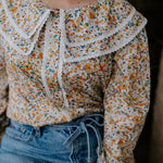 Britt yellow floral women's shirt worn showing cheerful yellow floral country casual style