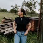 NURSING Kellie ruffle women's black gingham contrast polo flatlay showing full nursing polo design