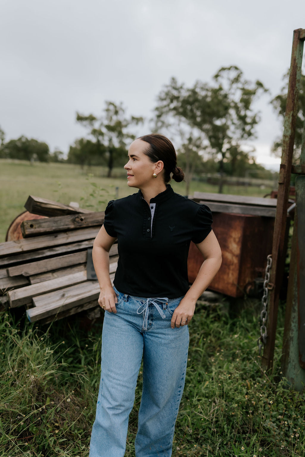 NURSING Kellie ruffle women's black gingham contrast polo flatlay showing full nursing polo design