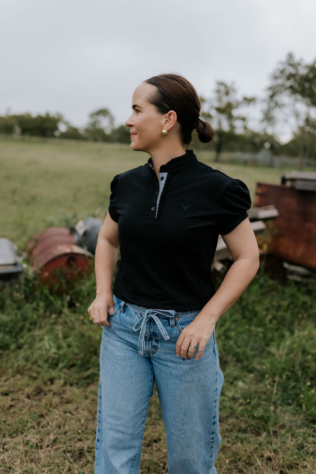 NURSING Kellie ruffle women's black gingham contrast polo back view showing relaxed women's fit