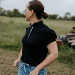 NURSING Kellie ruffle women's black gingham contrast polo ruffle detail showing beautiful black ruffle trim