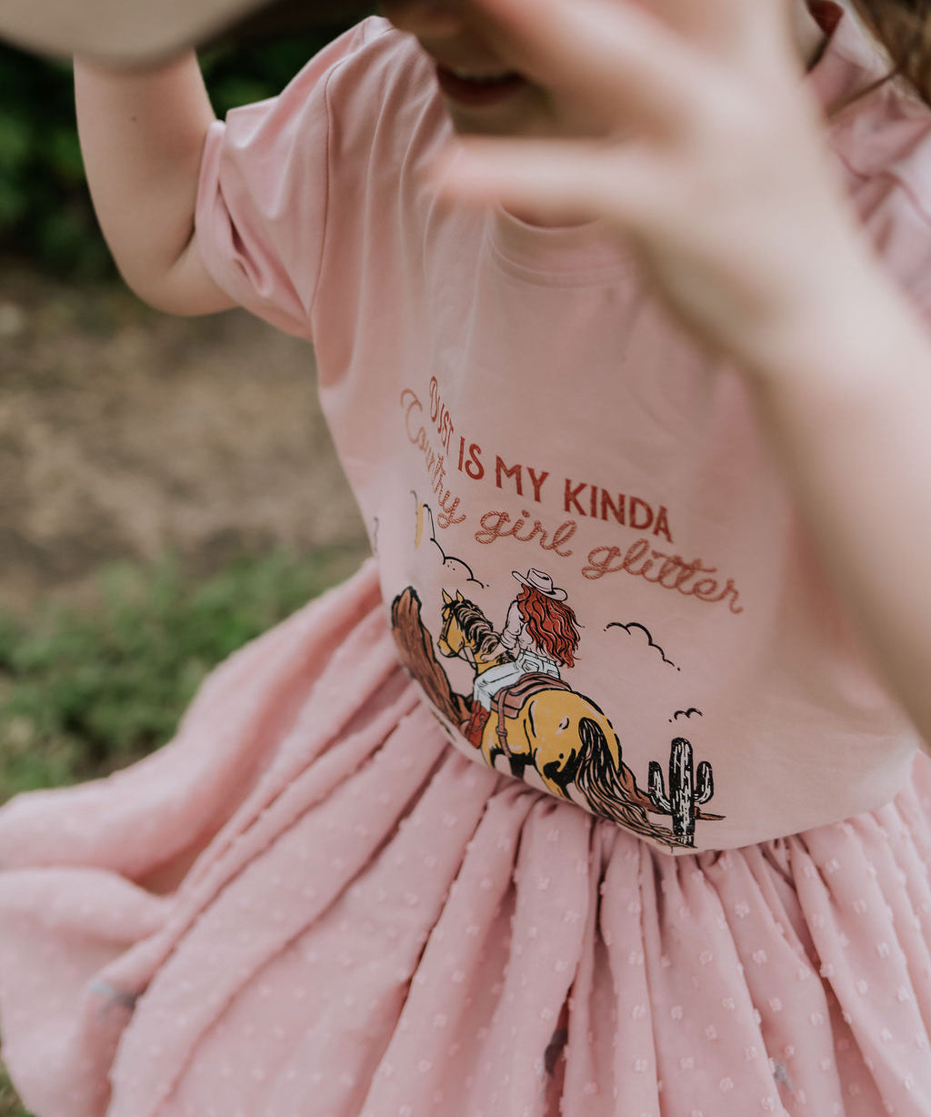 Country Girl Glitter Yeehaw graphic kids tee back view showing relaxed fit on quality kids tee