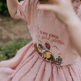 Country Girl Glitter Yeehaw graphic kids tee back view showing relaxed fit on quality kids tee