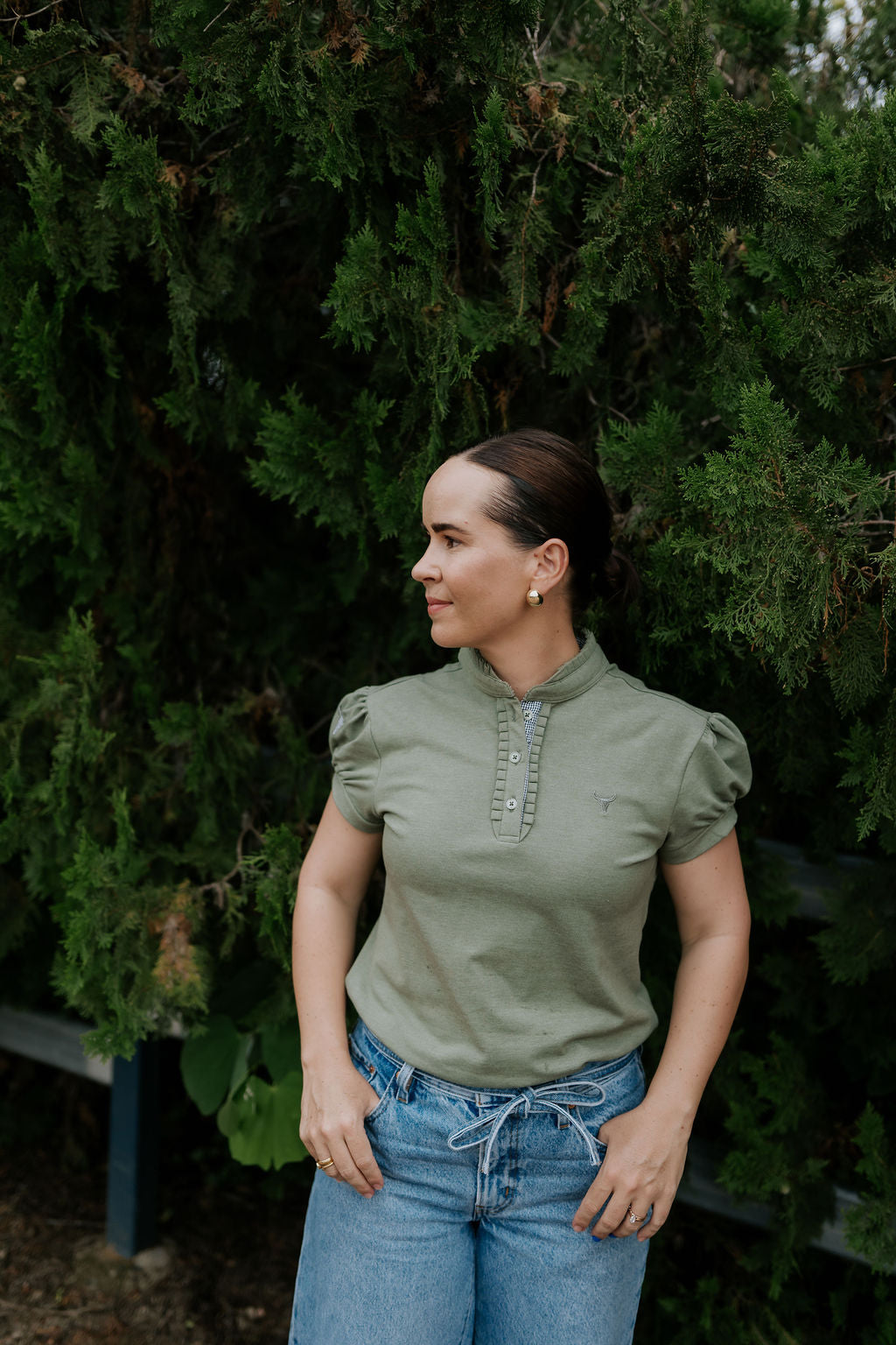 Kate khaki ruffled collar women's polo shirt front view showing elegant khaki polo with ruffle collar