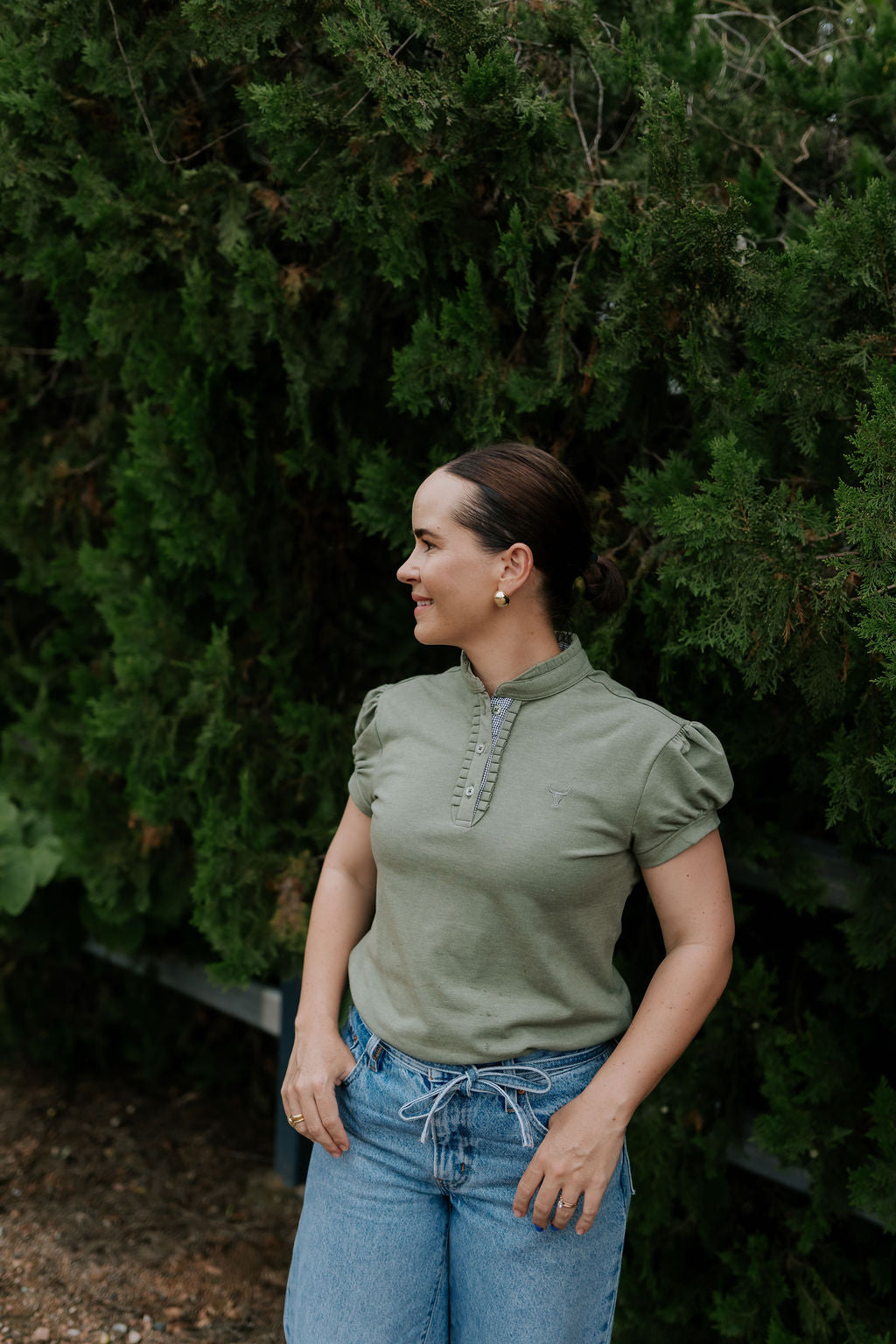 Kate khaki ruffled collar women's polo shirt flatlay showing full khaki ruffle polo design