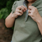 Kate khaki ruffled collar women's polo shirt worn showing polished khaki ruffle collar country style